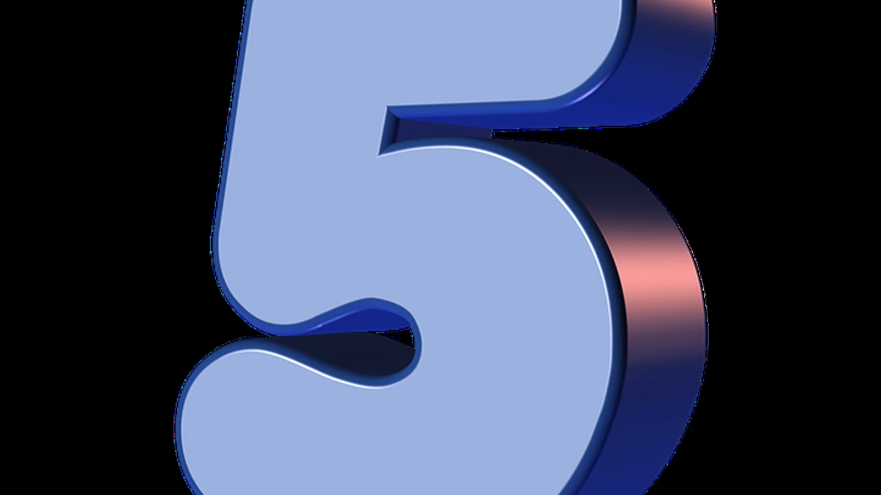 overhead view of corned beef sliced and on a platter with cabbage, potatoes, and carrots